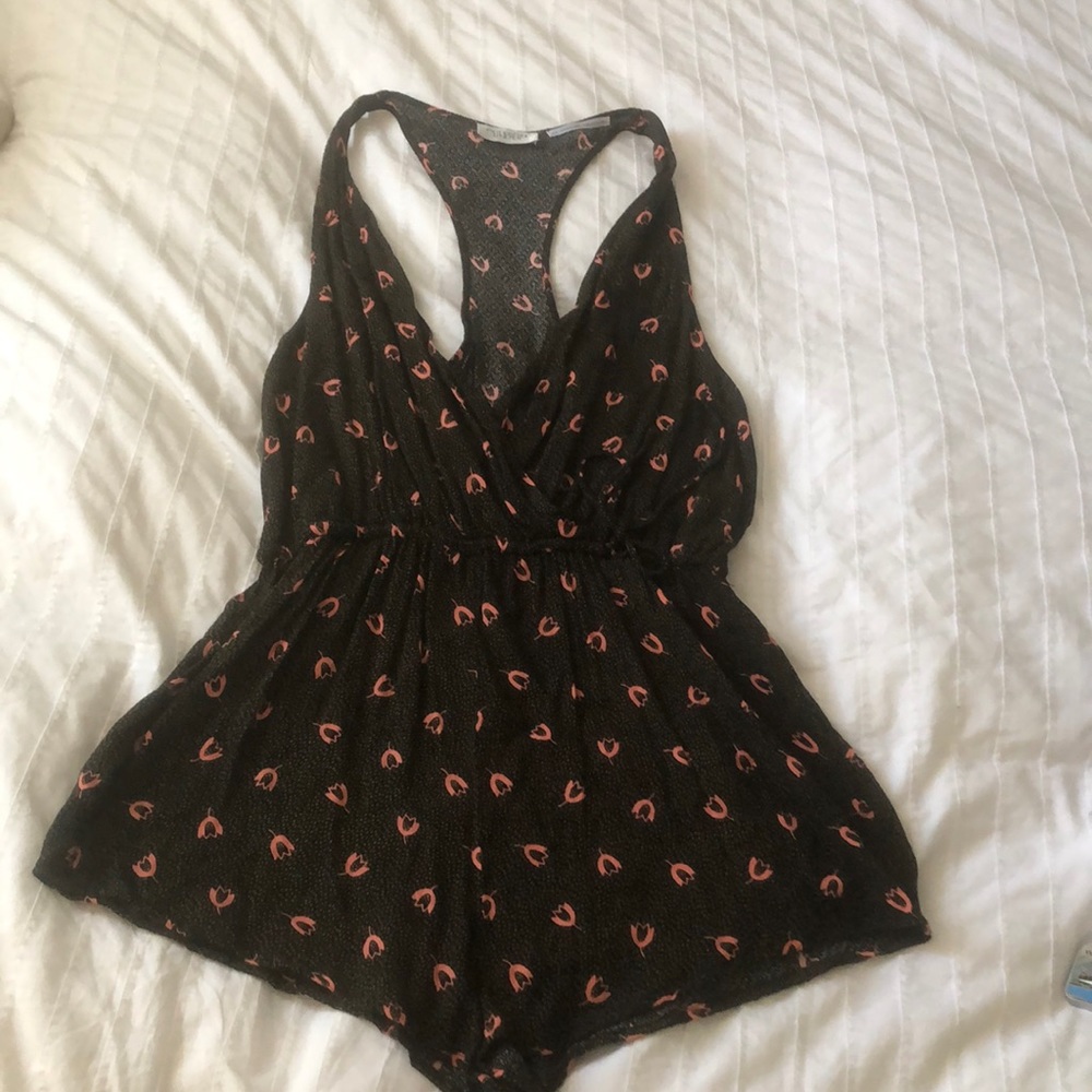 Black romper with pink tulip print